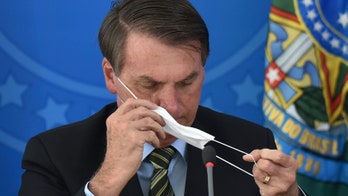 Bolsonaro balks against more coronavirus protections as cases in Brazil near 5,000