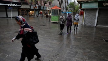 Syrians rush to stock up; Iran reports 127 more virus deaths