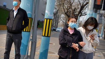 Who are the key players in China's coronavirus propaganda war with US?