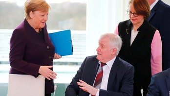 Amid coronavirus fears, Angela Merkel’s handshake refused by interior minister