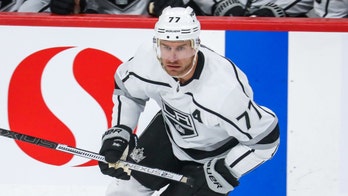 Los Angeles Kings' Jeff Carter gets toilet paper delivery from teammate via drone