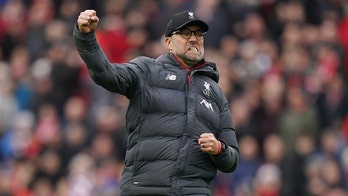 No handshakes in EPL but Klopp fist-pumping again after win