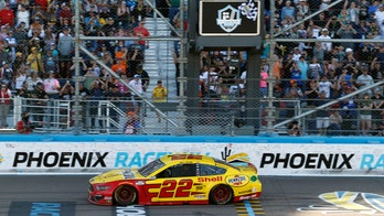 Joey Logano holds off Kevin Harvick for Phoenix NASCAR Cup win