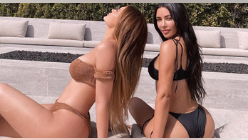 Kylie Jenner, Kim Kardashian pose in bikinis in Instagram snap: 'Wear your sunscreen'