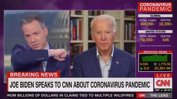 CNN's Jake Tapper teaches Biden how to cough properly in awkward interview moment