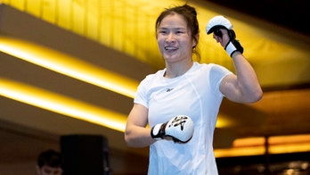 Adesanya, Zhang carry global appeal into UFC 248 title bouts