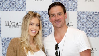 Ryan Lochte’s wife Kayla goes topless, while he wears her outfit in viral ‘Flip the Switch’ challenge