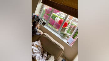 Heartwarming moment mom surprises daughter in isolation for her birthday