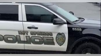 Arkansas police officer fatally shot during traffic stop; suspect's condition unclear