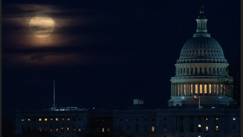 Supermoon seen behind US Capitol in beautiful image