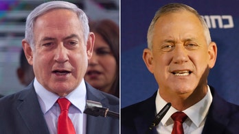 Israeli election exit polls put Netanyahu, allies just short of majority