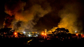 Coronavirus lockdown in Brazil's jails spurs 'hundreds' of inmates to escape