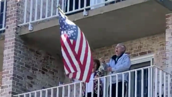 Pennsylvania senior living facility residents social distance for coronavirus, sing 'God Bless America' from balconies