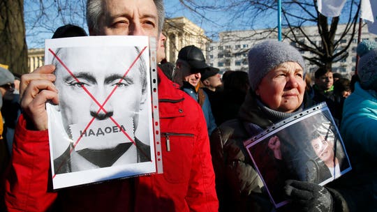 Thousands in Moscow protest constitutional changes seen as Putin power grab