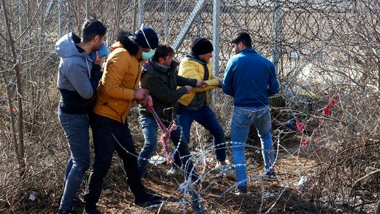 Thousands of migrants rush border as Greek army deploys