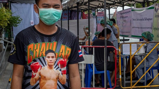 Kickboxing match in Bangkok leads to spike in coronavirus infections