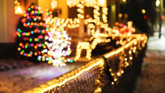 Neighbors rally behind grieving woman harassed for having Christmas lights up