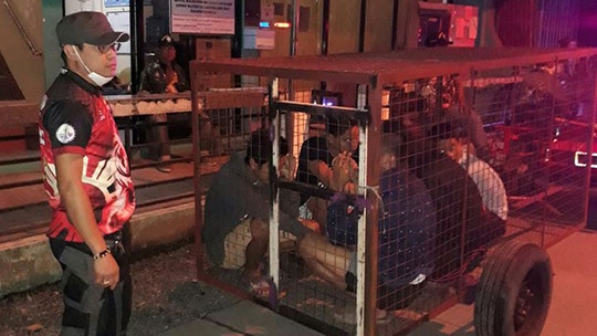 Coronavirus lockdown in Philippines lands official in trouble after violators placed in dog cage