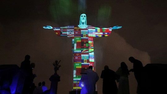 Christ the Redeemer lit up with every country affected by coronavirus: 'Pray together'