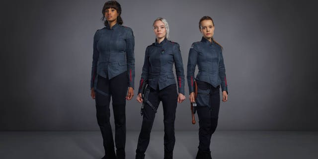 Freeform's "Motherland: Fort Salem" stars (L-R) Ashley Nicole Williams as Abigail Bellweather, Taylor Hickson as Raelle Collar, and Jessica Sutton as Tally Craven.
