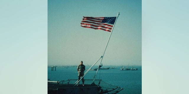 Marine David Price and the American flag (Facebook/David Price)