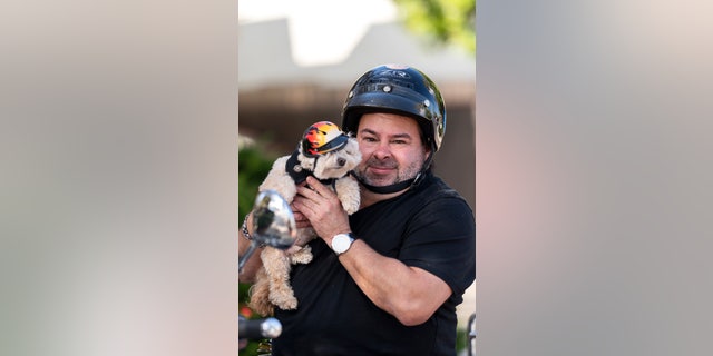 Big Ed with his dog, Teddy.