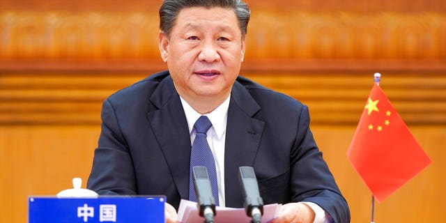 In this photo released by Xinhua News Agency, Chinese President Xi Jinping attends the G20 Extraordinary Virtual Leaders' Summit on COVID-19 via video link in Beijing, capital of China, March 26, 2020.