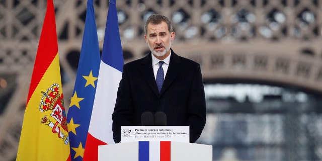 Spain's King Felipe VI delivers speech at ceremony honoring victims of terror attacks in Europe, on the 16th anniversary of Madrid attacks, at the Trocadero in Paris, Wednesday March 11, 2020. (Gonzalo Fuentes/Pool via AP)