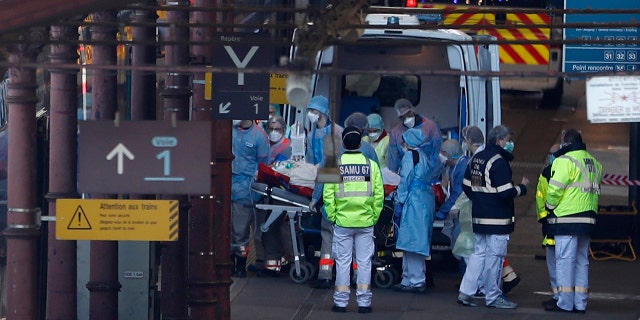 A patient is transferred in a high-speed train turned into an intensive care unit in Strasbourg on Thursday. (AP Photo/Jean-Francois Badias)