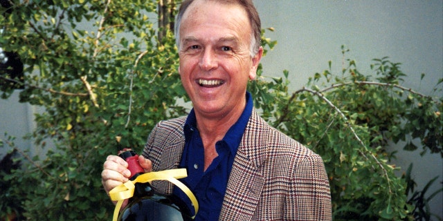 This circa 1985 photo provided by Esme Gibson shows Joe Coulombe, the founder of the Trader Joe's market chain, at his home in Pasadena, Calif. Coulombe, the man who created Trader Joe's markets with a vision that college-educated but poorly paid young people would buy healthy foods if they could only afford them, has died. (Image by Esme via AP)