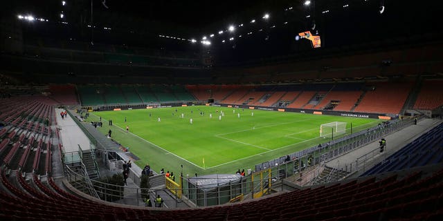 The seats are empty as a precaution against the coronavirus at the San Siro stadium in Milan, Italy, during the Europa League round of 32 second leg soccer match between Inter Milan and Ludogorets.