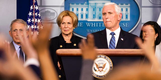 Vice President Mike Pence, with White House coronavirus response coordinator Dr. Deborah Birx second from left, and Director of the National Institute of Allergy and Infectious Diseases at the National Institutes of Health Anthony Fauci, left, and other members of President Donald Trump's coronavirus task force, speaks to reporters in the Brady press briefing room of the White House, Monday, March 2, 2020, in Washington. (AP Photo/Manuel Balce Ceneta)