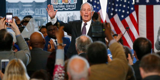 FILE - In this Sunday, Jan. 19, 2020, file photo, Democratic presidential candidate and former New York City Mayor Mike Bloomberg waves to the crowd at the conclusion of his speech at the Greenwood Cultural Center in Tulsa, Okla. Bloomberg spent heavily on advertising and nearly two dozen field staffers in Oklahoma and has made multiple campaign stops in the Sooner State. (AP Photo/Sue Ogrocki, File)