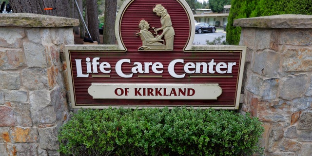 A sign at the entrance of the Life Care Center in Kirkland, Wash., near Seattle.