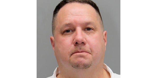 This undated photo provided by the Fairfax County Police Police shows Michael Hetle. Fairfax County police said Hetle, 52, was arrested on Tuesday, March 3, 2020, in the shooting death of Maryland National Guard Specialist Javon Prather, 24, in Springfield, Virginia. (Fairfax County Police via AP)