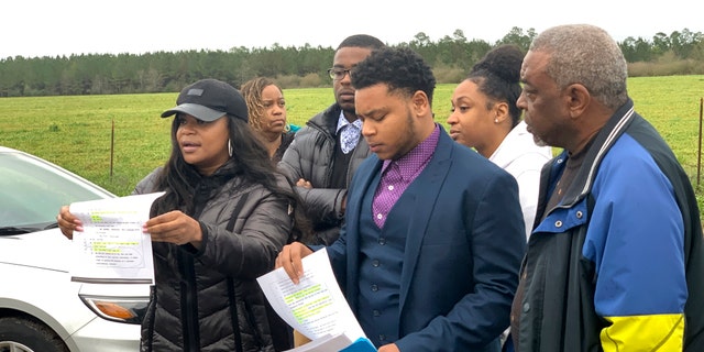 Family members of condemned Alabama inmate Nathaniel Woods speak to reporters outside Holman Correctional Facility ahead of his scheduled execution on Thursday, March 5, 2020 in Atmore, Ala. (Associated Press)