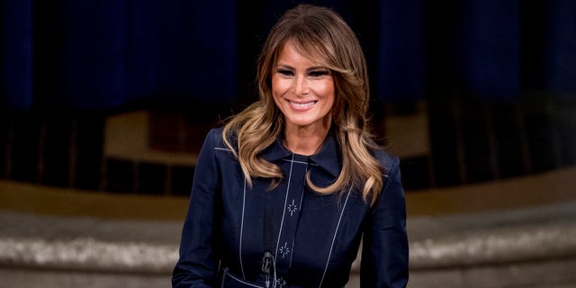 First lady Melania Trump smiles during a speech at the Justice Department's National Opioid Summit at the Department of Justice on Friday in Washington. (AP Photo/Andrew Harnik)