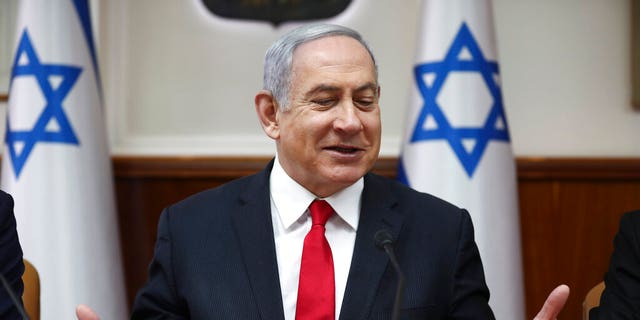Israeli Prime Minister Benjamin Netanyahu chairs the weekly cabinet meeting in Jerusalem, Sunday, March. 8, 2020. 