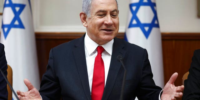 Israeli Prime Minister Benjamin Netanyahu chairs the weekly cabinet meeting in Jerusalem, Sunday, March. 8, 2020. (AP Photo/Oded Balilty, Pool)