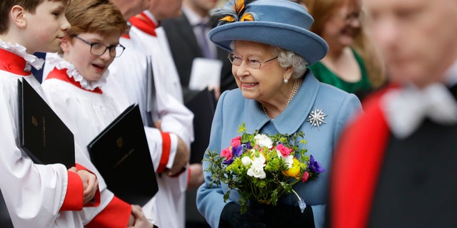 Britain's Queen Elizabeth II leaves after attending the annual Commonwealth Day service at Westminster Abbey in London, Monday, March 9, 2020. 