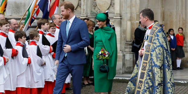 Britain's Harry and Meghan the Duke and Duchess of Sussex leave after attending the annual Commonwealth Day service at Westminster Abbey in London, Monday, March 9, 2020. 