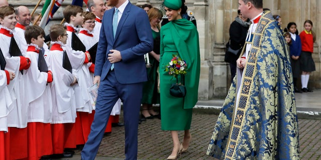 Britain's Harry and Meghan the Duke and Duchess of Sussex leave after attending the annual Commonwealth Day service at Westminster Abbey in London, Monday, March 9, 2020.