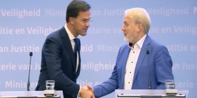 Netherlands' Prime Minister Mark Rutte called on citizens of the Netherlands to stop shaking hands to prevent spreading the new coronavirus and then shook hands with the head of the infectious diseases department of the national public health institute.