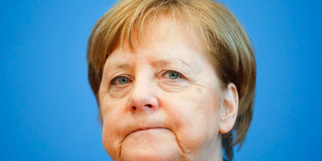 German Chancellor Angela Merkel attends a news conference about the coronavirus outbreak in Germany, in Berlin, Germany, Wednesday, March 11, 2020.