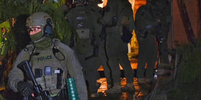 DEA agents ransack a residential home during the arrest of a suspected drug trafficker on Wednesday, March 11, 2020 in Diamond Bar, California.