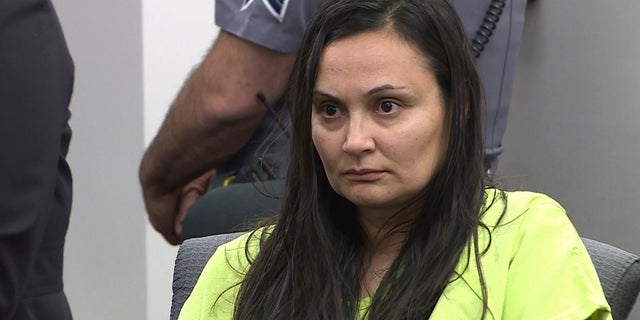 Letecia Stauch makes her first appearance in El Paso County District Court in Colorado Springs, Colo. Stauch faces several charges, including first-degree murder of a child, in the presumed death of 11-year-old Gannon Stauch. (KRDO-TV/The Gazette via AP, Pool)