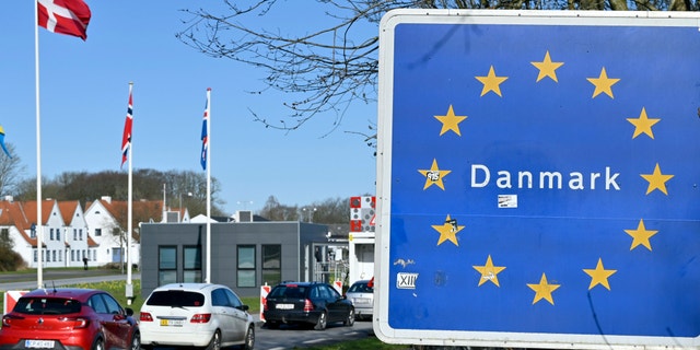 Cars head north to the German-Danish border crossing near Flensburg, Germany, Saturady, March 14, 2020. Denmark closes its borders from noon in the Coronavirus crisis until further notice. (Carsten Rehder / dpa via AP)