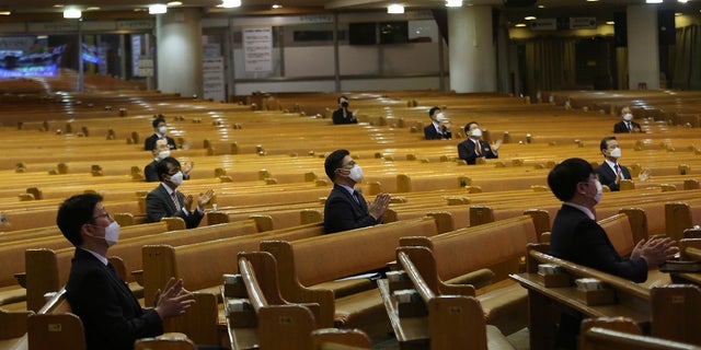 Pastors wearing face masks attend a service at the Yoido Full Gospel Church in Seoul, South Korea. (AP Photo/Ahn Young-joon)