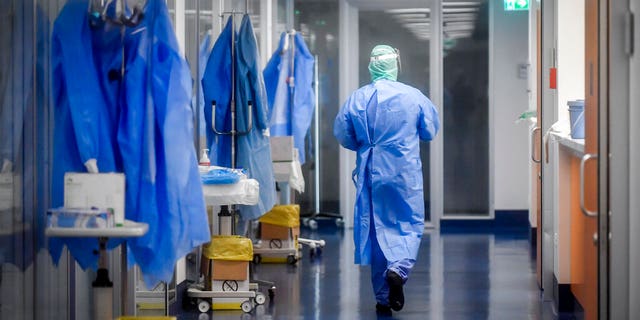 A view of the corridor outside the intensive care unit of the hospital of Brescia, Italy, Thursday, March 19, 2020.