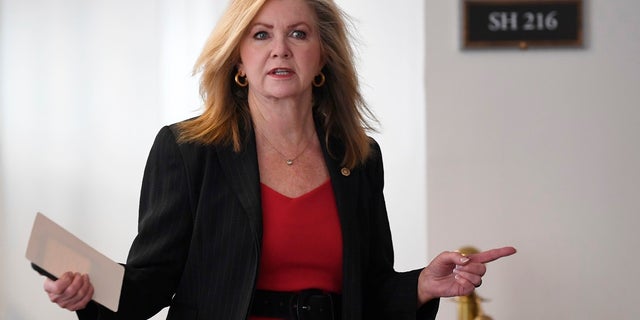Sen. Marsha Blackburn, R-Tenn., heads into a Republican policy lunch on Capitol Hill in Washington on Thursday. Blackburn is pushing through legislation to decrease U.S. dependency on other countries for life-saving medication amid veiled threats from China to withhold coronavirus drugs. (AP Photo/Susan Walsh)